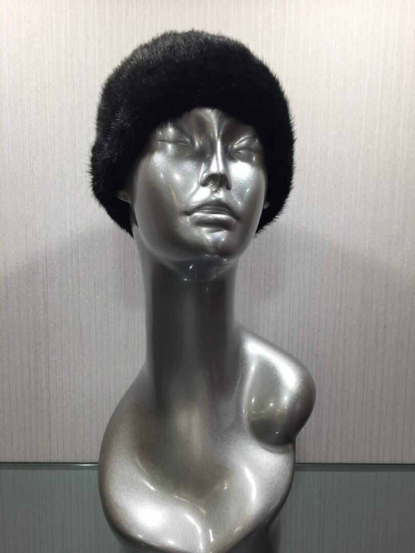 mannequin wearing knitted mink headband