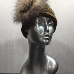 mannequin wearing brown knit headband with fox flower