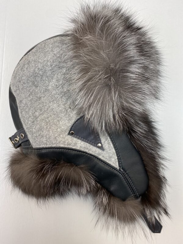 A Grey Color Head Cap With Fur Ends
