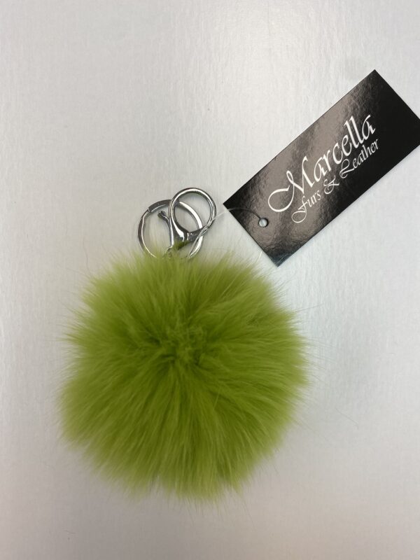 A Green Color Fur Ball Keychain With Silver Ring Copy