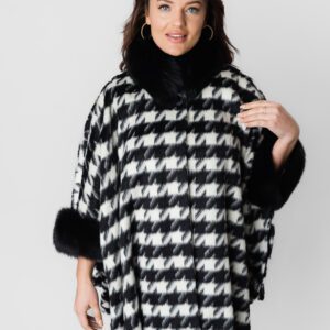 A Black and White Pattern Jacket With Black Fur Ending