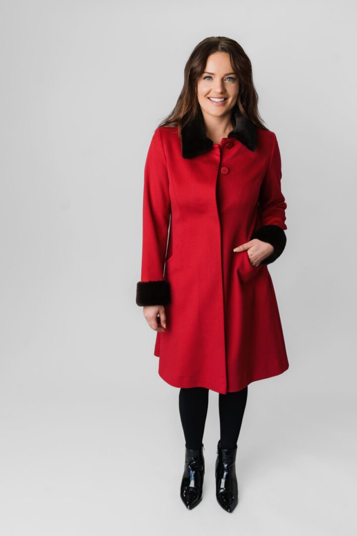 A Red Color Coat With Black Fur Collar and Sleeves