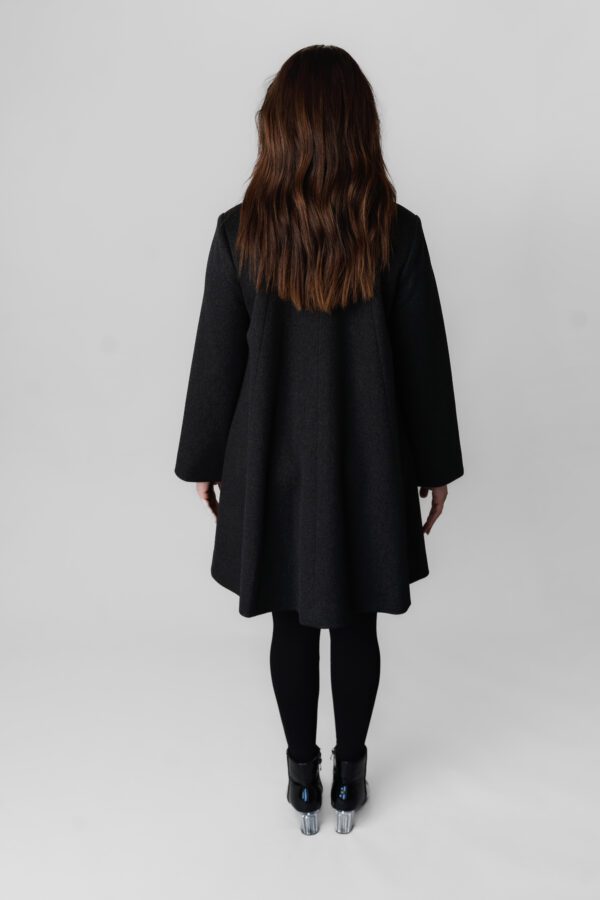 A Black Color Ful Sleeves Coat With Button Fit Back