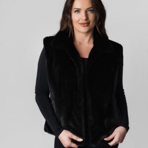 A Woman in a Black Color Velvet Coat