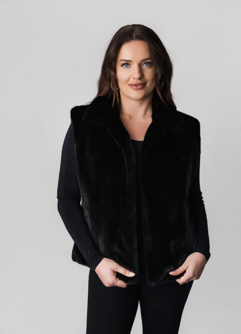 A Woman in a Black Color Velvet Coat