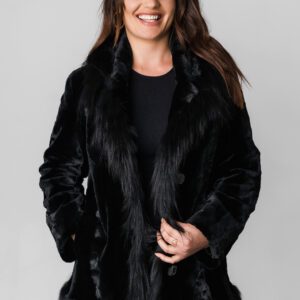 A Woman Wearing a Black Jacket With Fur Lining