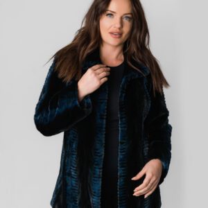 A Woman Wearing a Blue Coat With Black Pattern