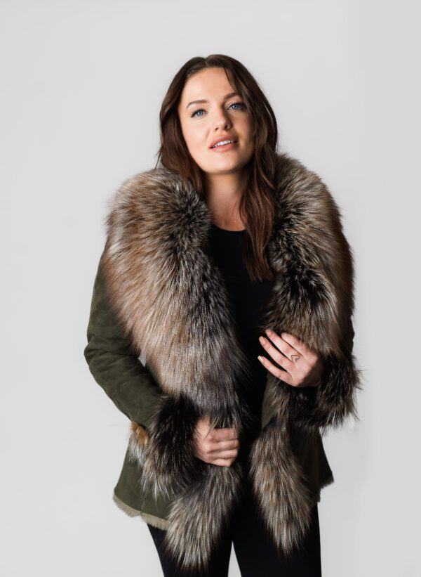 An Olive Green Coat With Fox Fur Lining