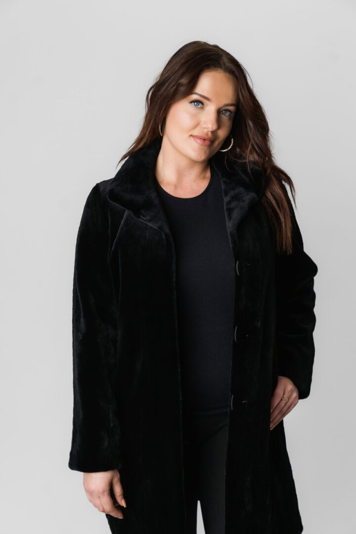 A Woman in a Velvet Standard Size Coat