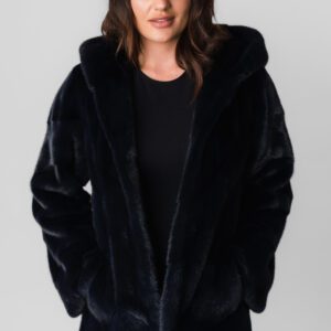 A Woman Wearing a Velvet Texture Black Standard Length Coat