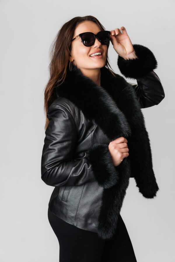 A Woman Wearing a Leather Jacket With Fur Lining